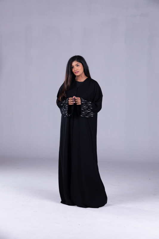 Women's Abaya made with Korean Nada Fabric and White Beads on Sleeves. AB1039